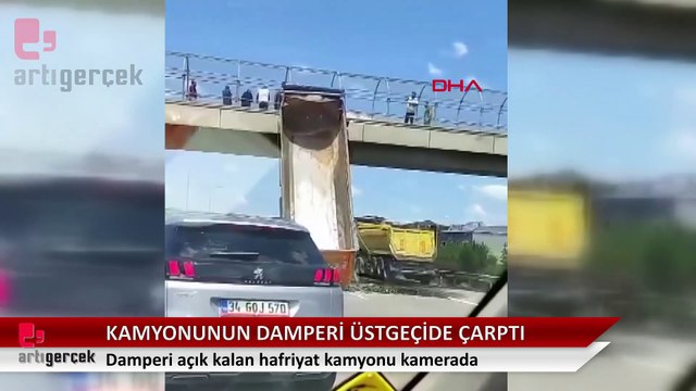 Hafriyat kamyonunun açık kalan damperi üstgeçide çarptı