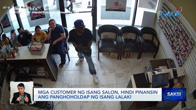 Mga customer ng isang salon, hindi pinansin ang panghoholdap ng isang lalaki | Saksi
