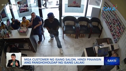 Mga customer ng isang salon, hindi pinansin ang panghoholdap ng isang lalaki | Saksi