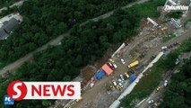 2 dead, 7 missing following central China landslide