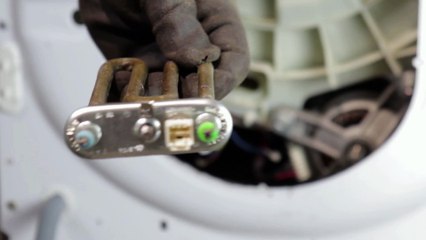 Comment changer la résistance CTN de mon lave-linge ?