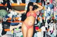 Pregnant Rihanna uploads another photo of her belly posing in peach lingerie as she awaits