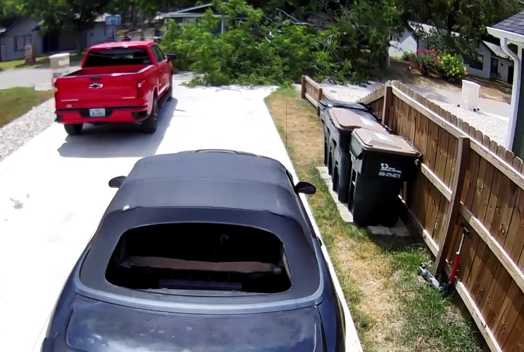 Tree Falls Just as Pickup Drives Away