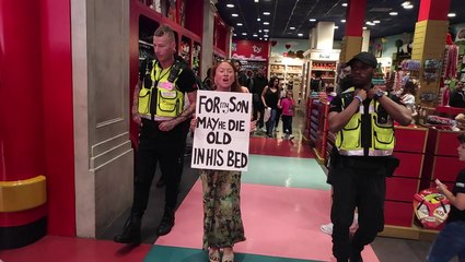 Download Video: Just Stop Oil activist escorted from Hamleys after staging protest ‘for her son’