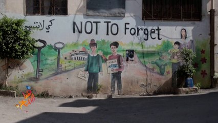 محمد شلبي.. فنان ينثر الأمل على جدران جنين