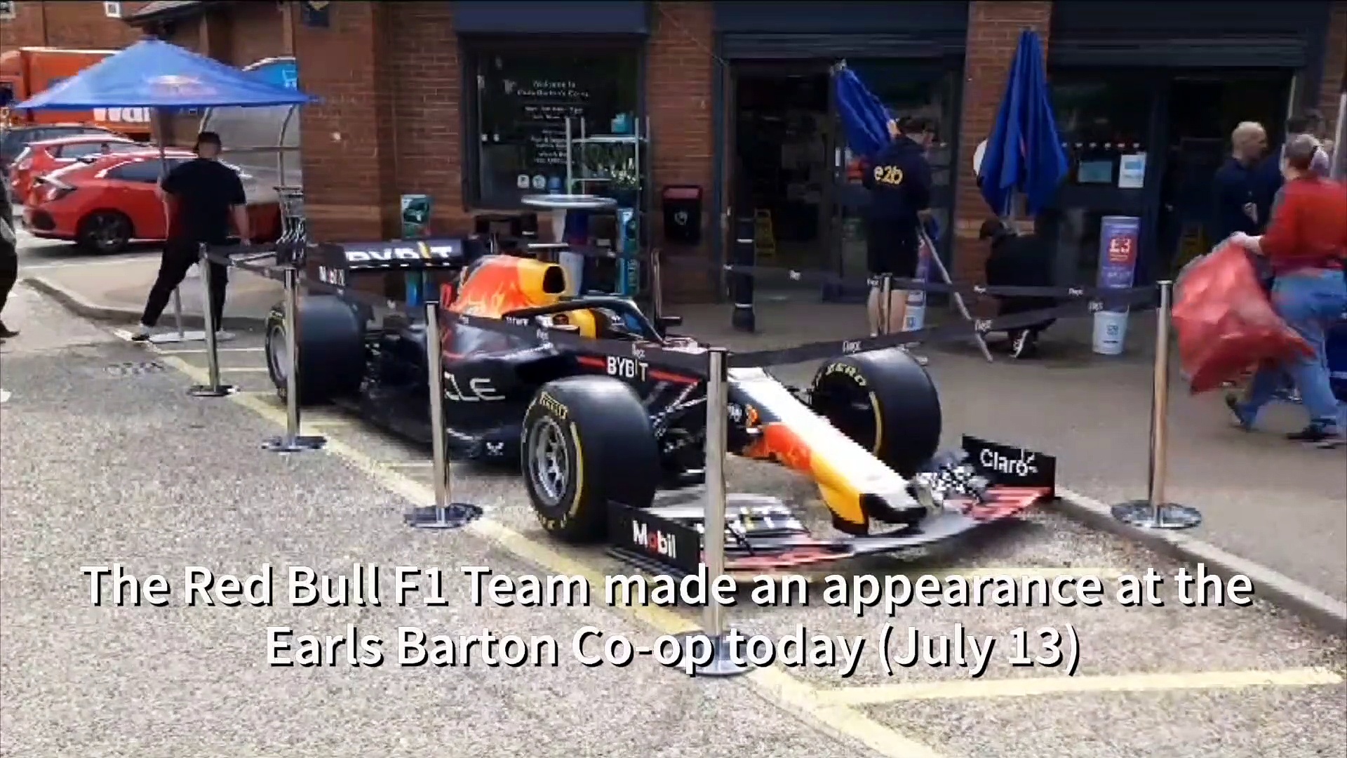 Red F1 Team celebrates Silverstone win with quick visit to Earls Barton Co-op | Northamptonshire Telegraph