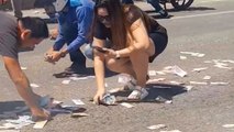 « Rendez l’argent » : des automobilistes se ruent sur l’autoroute pour ramasser des centaines de billets tombés d’un sac