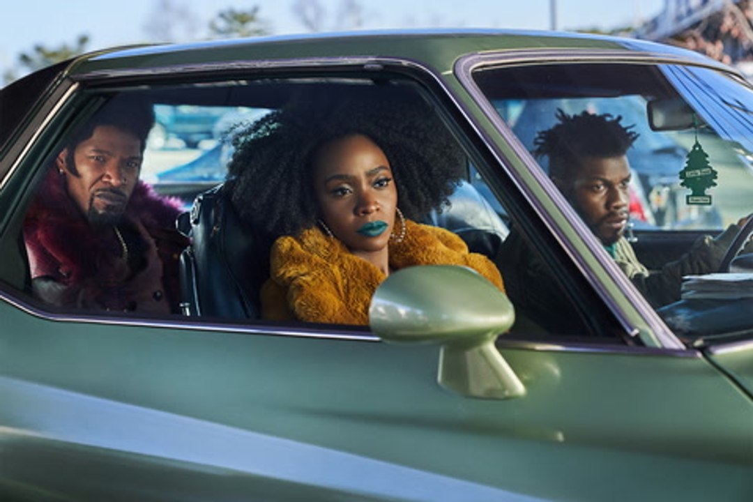 WATCH: Teyonah Parris And John Boyega Talk Conspiracies Come True And "They Cloned Tyrone"
