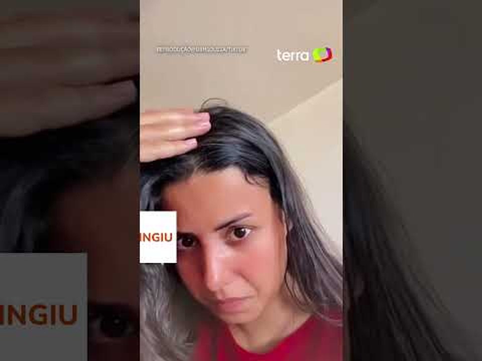 Ciclone: mulher mostra janela de apartamento que teria sido arrancada por ventania em São Paulo