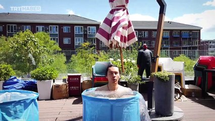 Çin'de sıcaktan bunalanların serinleme yöntemi: Buz banyosu