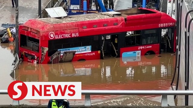Rescuers retrieve bodies of more flood victims trapped in submerged South Korea tunnel