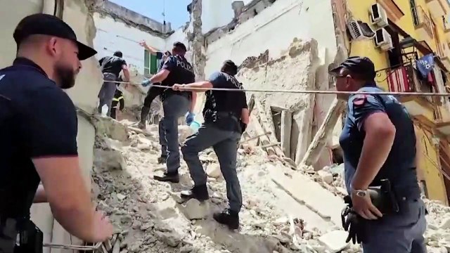Rescuers sift through rubble after Italian building collapses