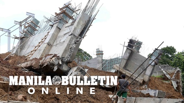 Residents search for salvageable items from destroyed houses due to landslide