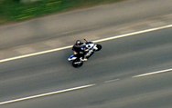 Watch: Reckless motorcyclist pulls wheelies during high-speed police chase