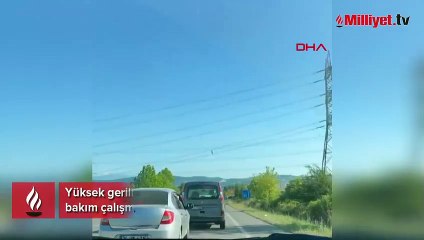 Yüksek gerilim hattında, personelin akrobatları aratmayan bakım çalışması kamerada