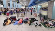 Greece wildfires: Rhodes tourists sleep on airport floor awaiting evacuation