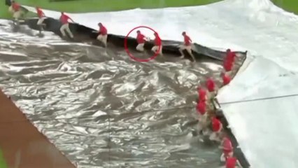 Cincinnati Reds Grounds Crew Member CONSUMED By Rain Tarp