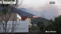 Wildfires fueled by heat wave spread throughout Greece