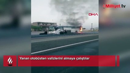 Yanan otobüsten valizlerini almaya çalıştılar