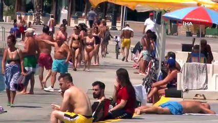 Sıcaktan kaçan vatandaşlar sahilde serinledi