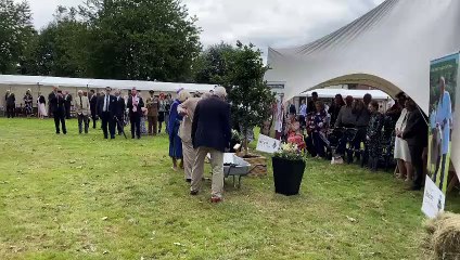King Charles III plants an oak sapling in Brecon