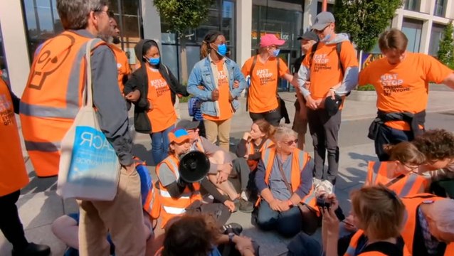 Just Stop Oil supporters surrounded by counter-protesters in London