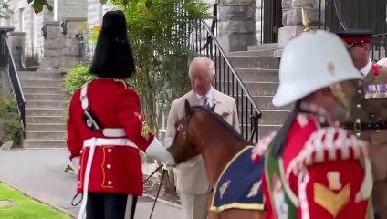 King Charles III chats during his visit to Brecon Barracks
