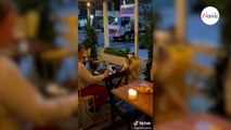 Restaurant-goers stare at man having wine because of his very special date-index