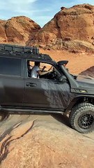 SUV Climbs Steep Slope