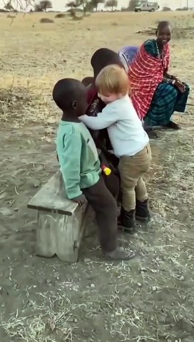 African Child Hugging