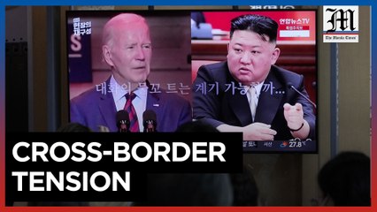 North Korea fires cruise missiles, silent on US soldier crossing