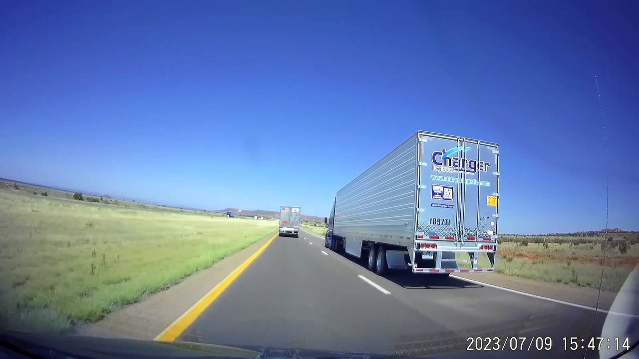 Dash Cam Captures Aggressive Trucker Running An...