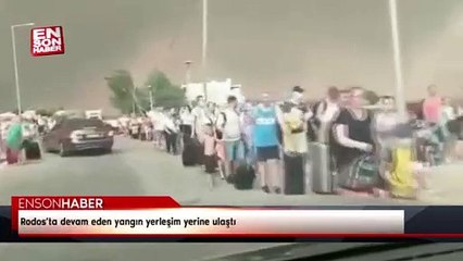 Rodos’ta devam eden yangın yerleşim yerine ulaştı