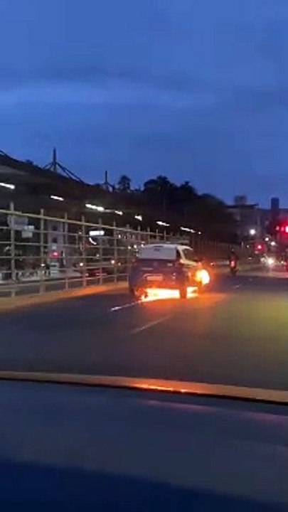 Flaming Car Pulls Over