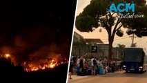 Greece evacuates thousands of tourists as wildfires rage during heatwave