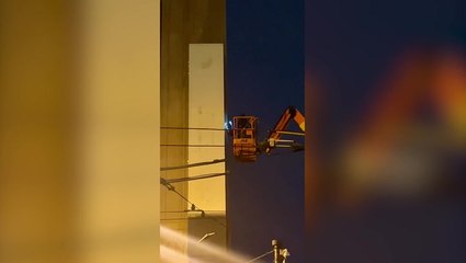 Luminous X sign glows on roof of Twitter building in San Francisco