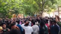 Students chant slogan condemning the incident in Manipur