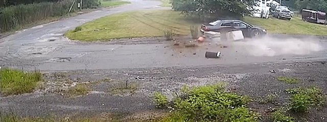 Car Drives Over Lawn To Hit Cement Mailbox