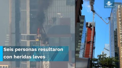 Se cae grúa en pleno centro de Nueva York y ocasiona incendio