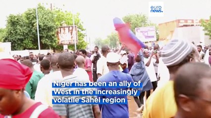 Niger's president vows democracy will prevail after mutinous soldiers detain him and declare a coup