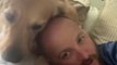 Golden Retriever Refuses to Leave Owners While They're Cuddling