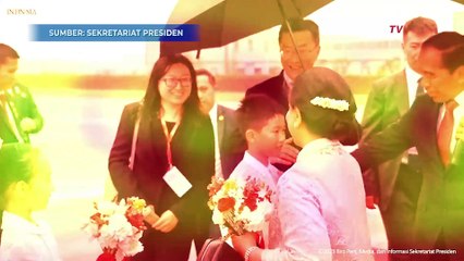 Iriana Jokowi Usap Wajah Anak yang Menyambutnya Saat Hujan di China