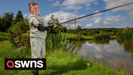 Boy, seven, born without arm holds fishing rod in two hands for the first time