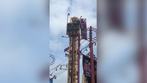 Watch as rescuers scramble to help terrified fair-goers stuck at top of 22-metre rollercoaster in Essex