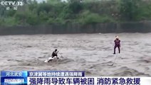 China: Man rescued from sinking car as floodwaters gush around him in wake of typhoon Doksuri