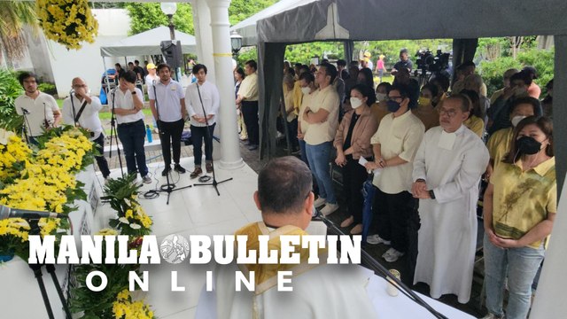 Relatives and supporters attend the mass of former president Cory Aquino to commemorate her 14th death anniversary