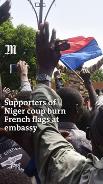 Supporters of Niger coup burn French flags at embassy