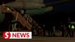 Planes carrying evacuees from Niger land in Europe