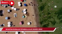 Sıcak havadan bunalan İstanbullular serinlemek için denize girdi