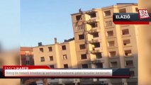 Elazığ'da hasarlı binadan ip sarkıtarak malzeme çalan hırsızlar kamerada
